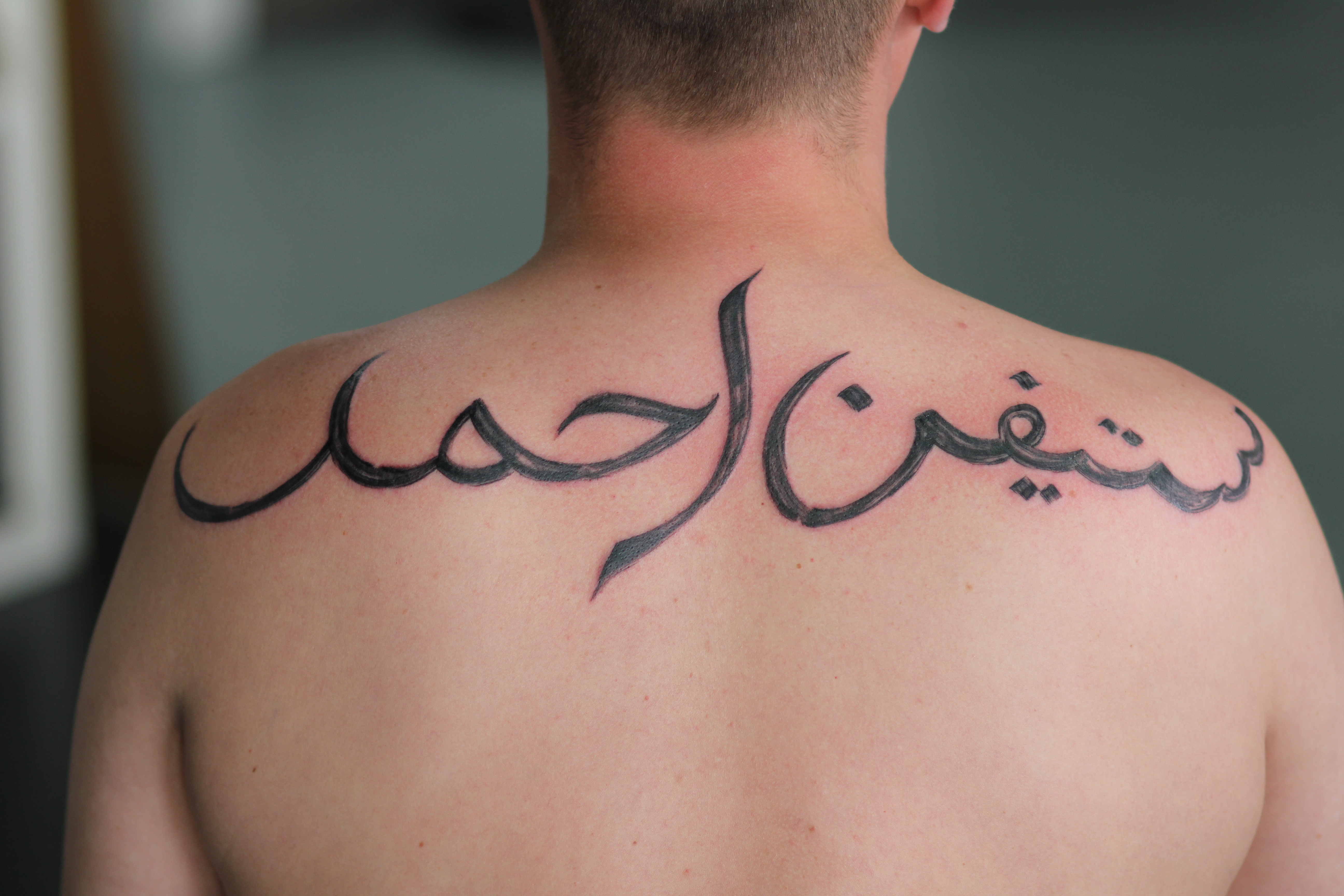 8. Small Spine Tattoos in Arabic - wide 7