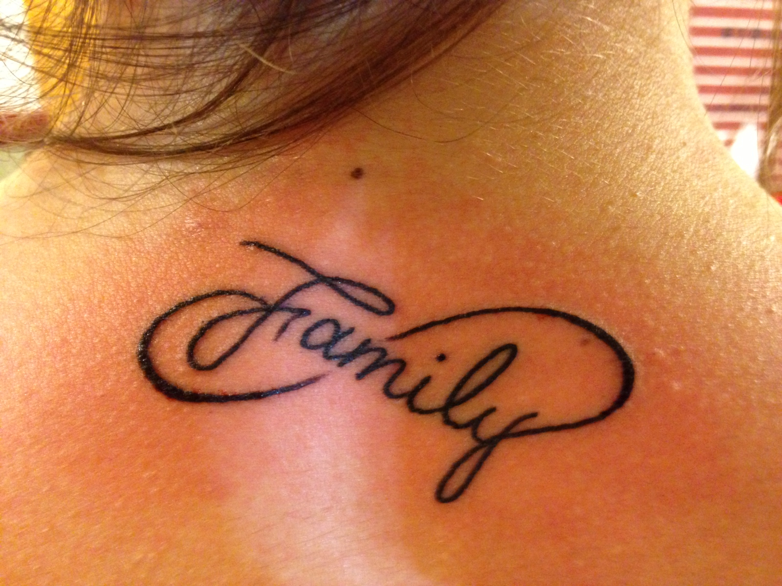 1. Family Love Tattoo Designs - wide 7