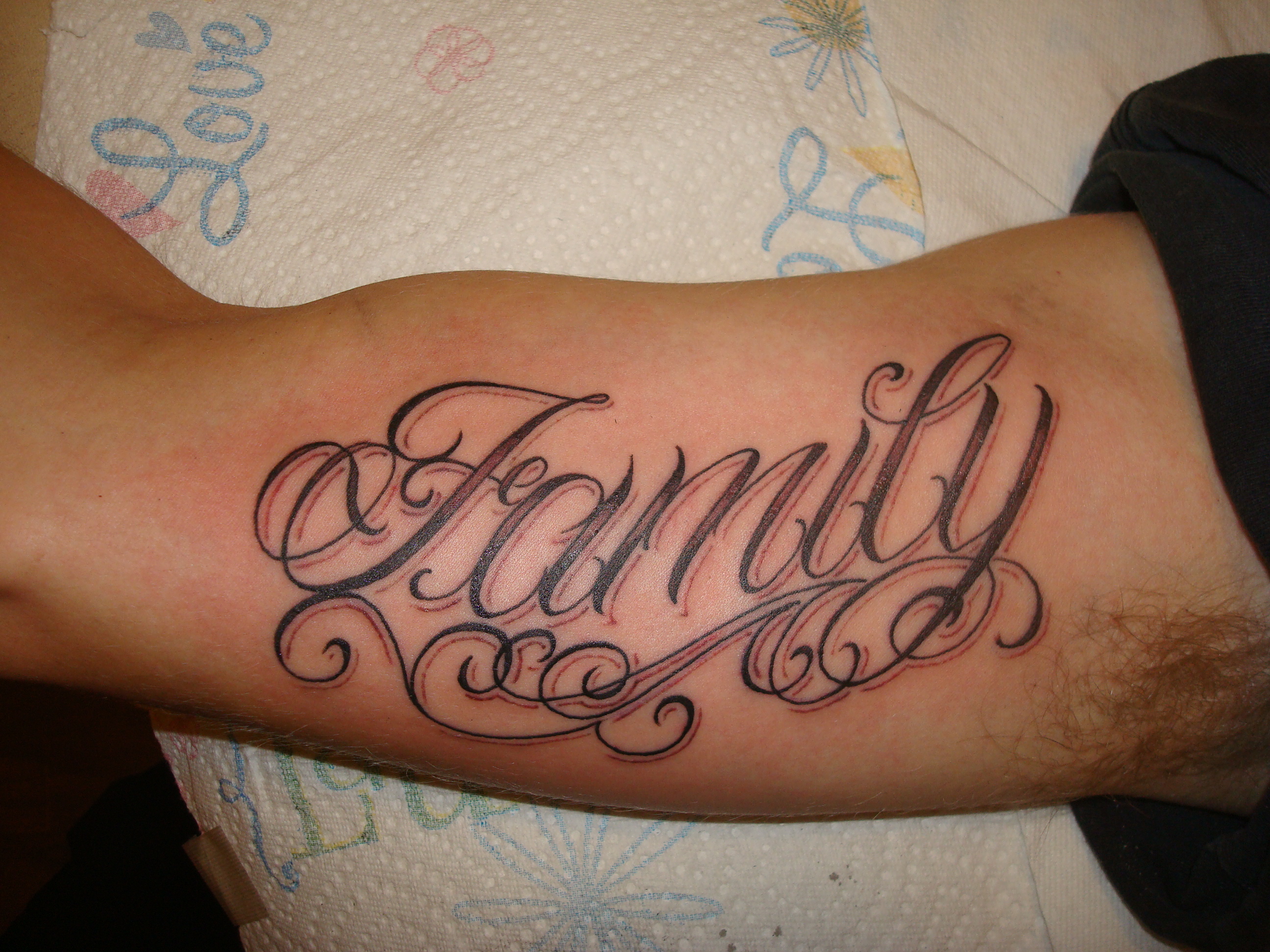 1. "Family Tattoo Designs on Side of Hand" - wide 4