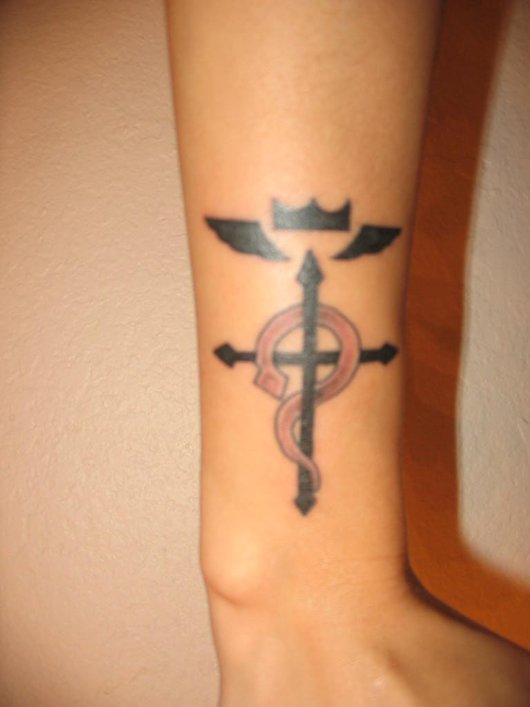 Cross Tattoo on Wrist