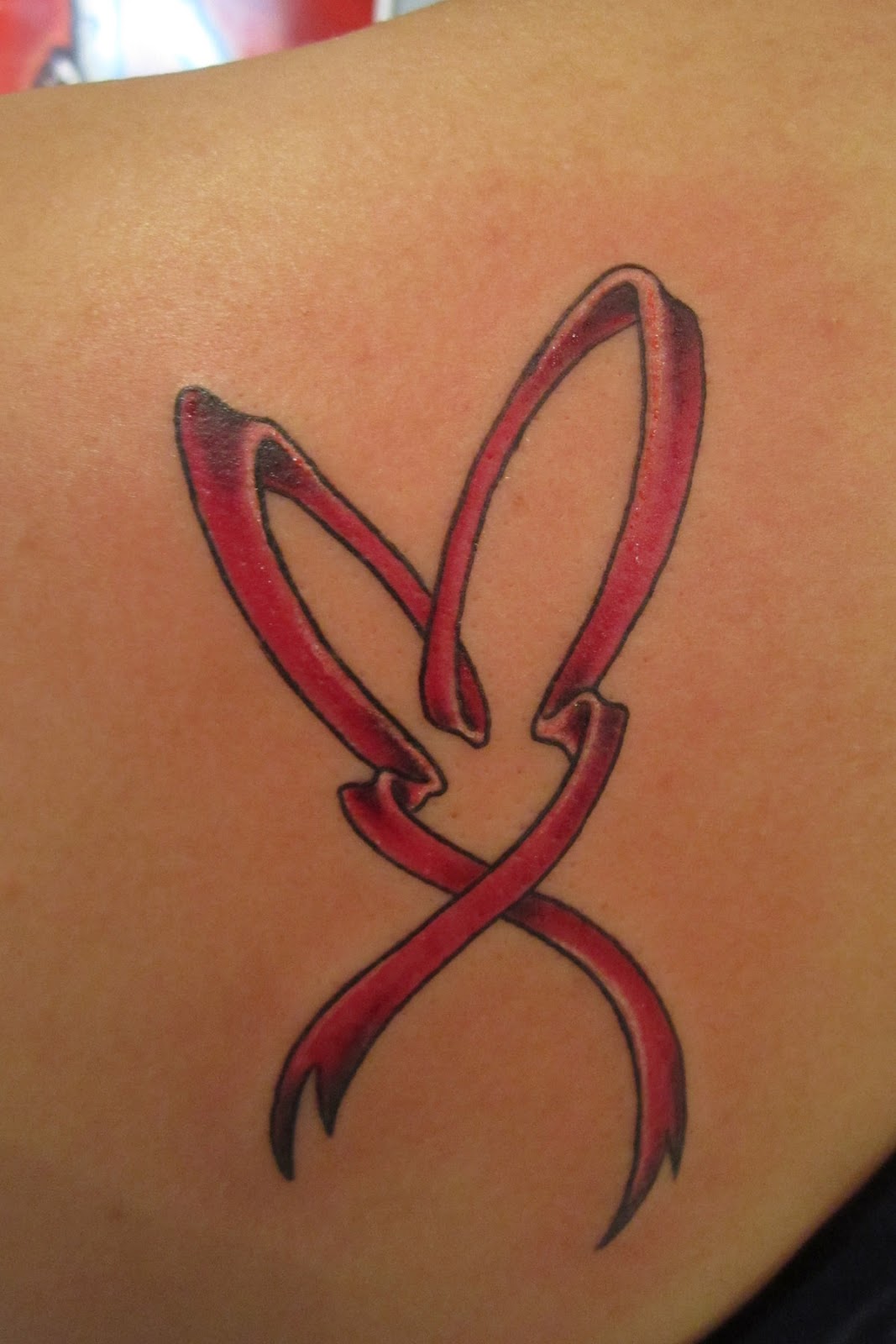 Breast Cancer Ribbon Tattoos.