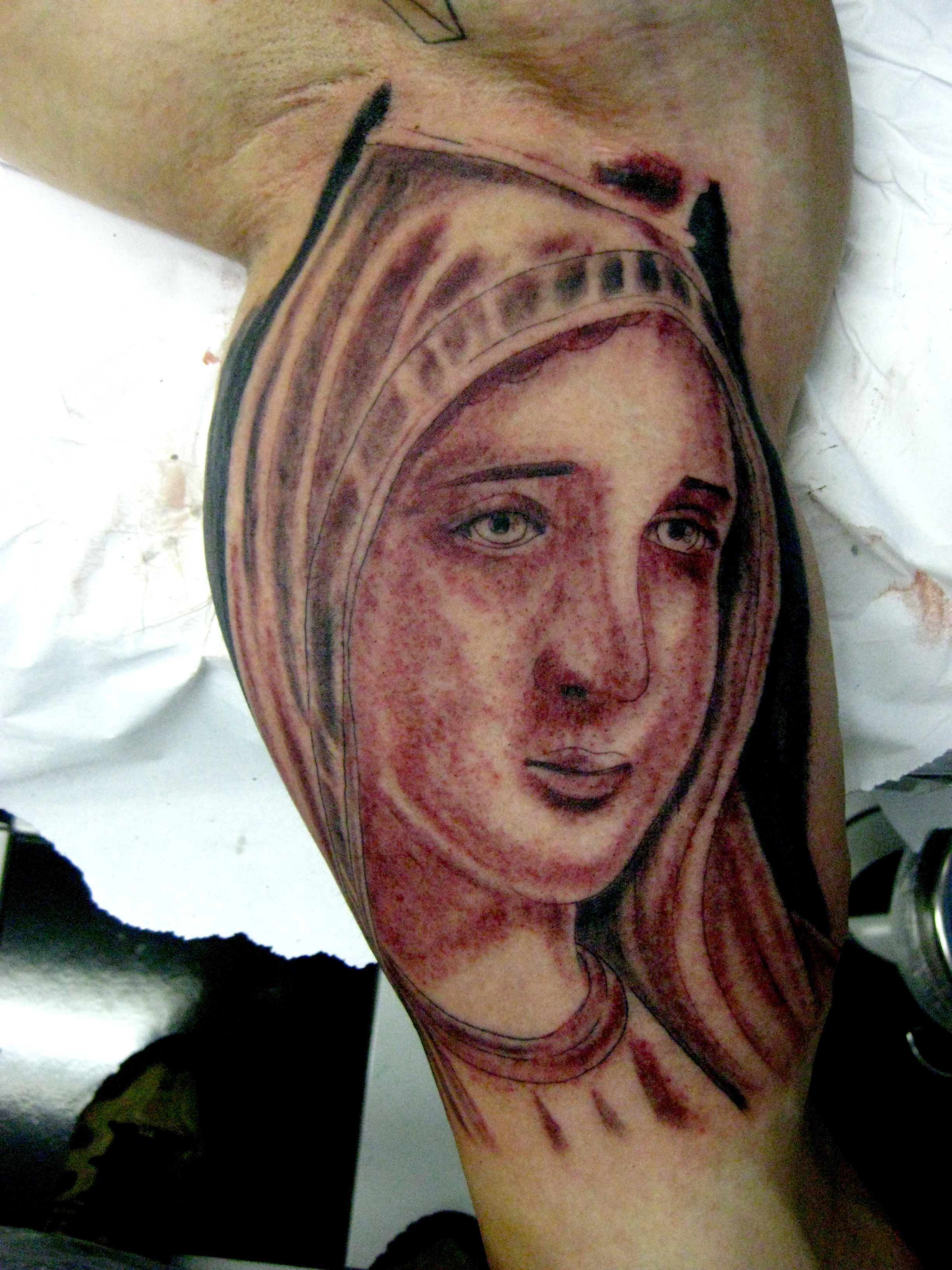 Virgin Mary Tattoo Designs.
