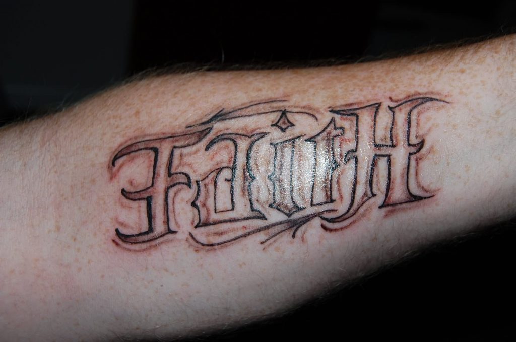 8. "The History and Cultural Significance of Word Tattoos" - wide 11