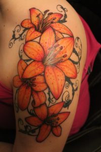 Lily Tattoos on Upper Arm