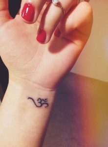 Om Tattoos on Hand