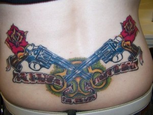 Guns and Roses Tattoo Lower Back