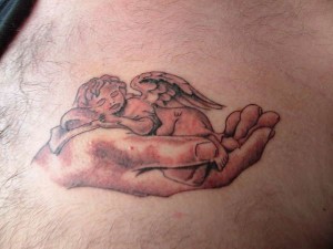 Sleeping Cherub Tattoos