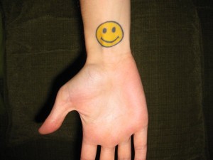 Smiley Face Tattoo