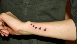 Tattoo of Birds Flying