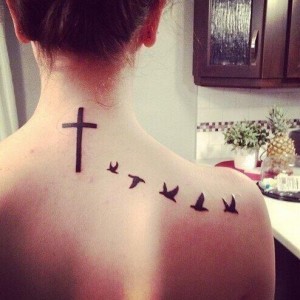 Tattoos of Birds Flying Away