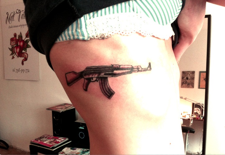 AK47 Tattoo on Girl.