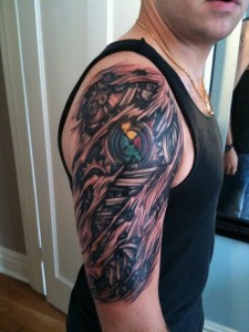 Biomech Tribal Tattoo