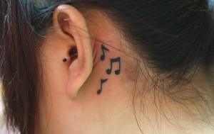 Dainty Tattoos Behind the Ear