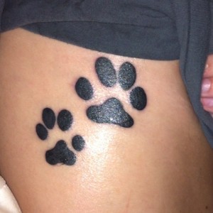 Dog Paw Print Tattoo on Ribs