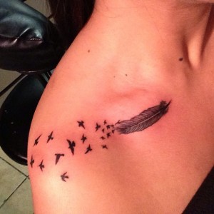 Feather Tattoo on Collarbone