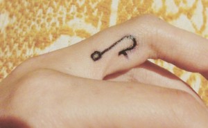 Fish Hook Tattoo on Finger