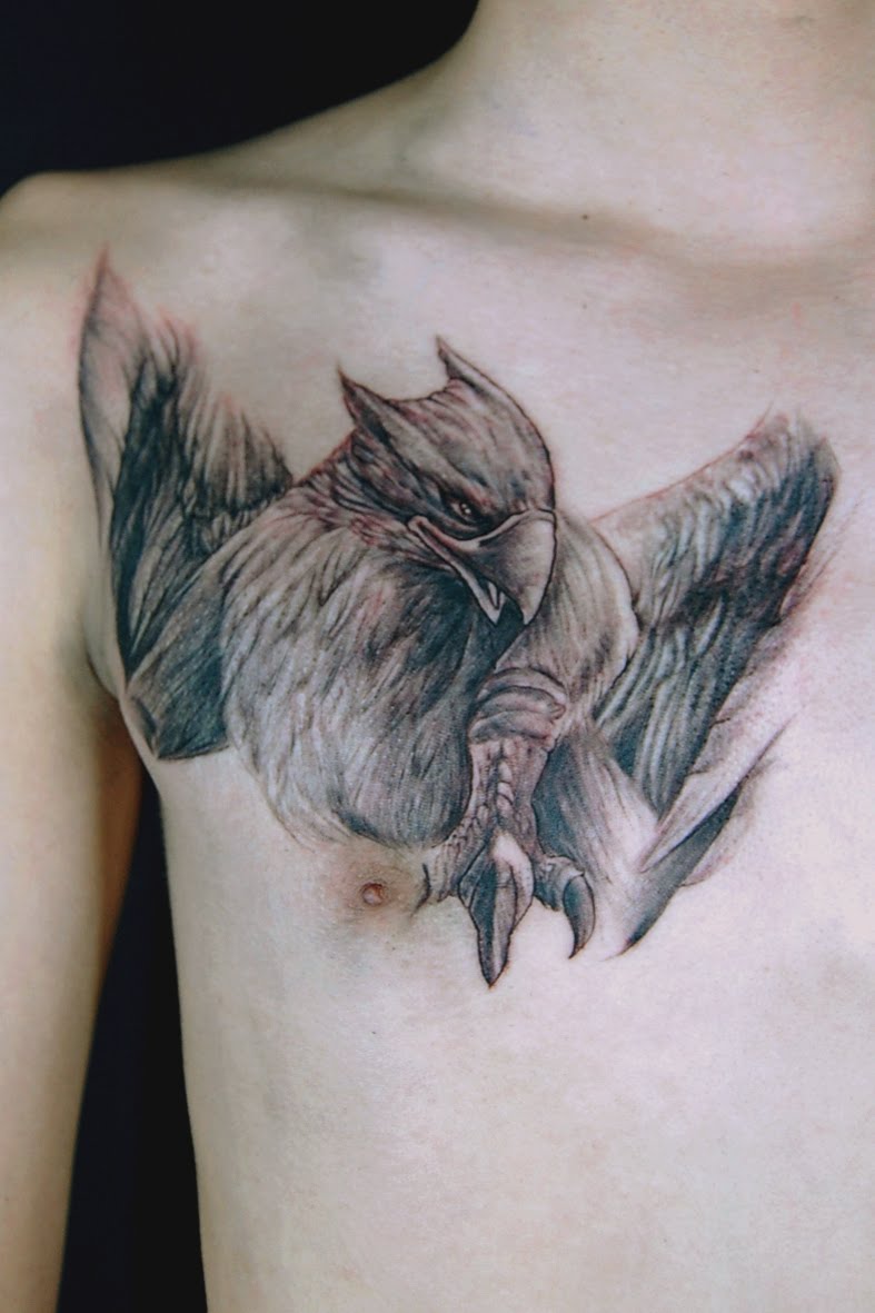 Griffin Chest Tattoo.