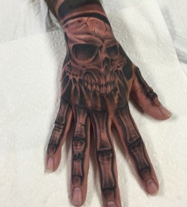 Hand Skull Tattoos