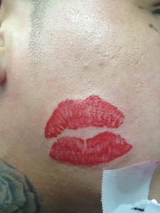 Kiss Face Tattoo