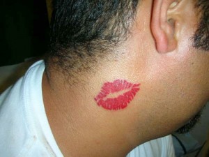 Kiss Tattoo on Neck
