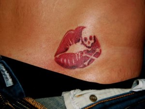 Kiss Tattoos on Stomach