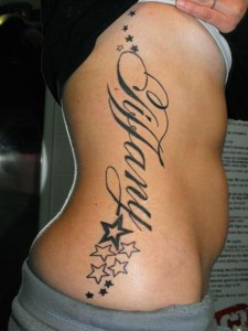 One Word Tattoos for Girls on Ribs