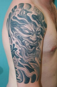 Oni Mask Tattoo Arm