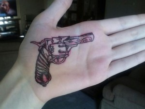 Pistol Tattoos on Hand
