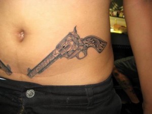 Pistol Tattoos on Hips Men