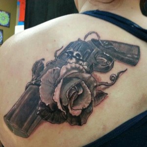 Pistol Tattoos with Roses
