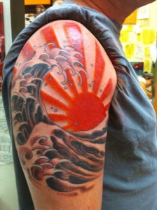 Rising Sun Shoulder Tattoo