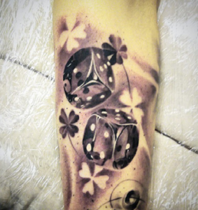 Rolling Dice Tattoo