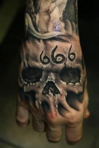 Skull Bone Hand Tattoo