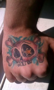 Skull Hand Tattoo Female