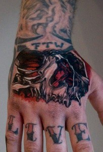 Skull Hand Tattoos