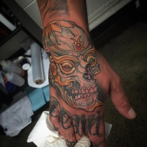 Skull on Hand Tattoo
