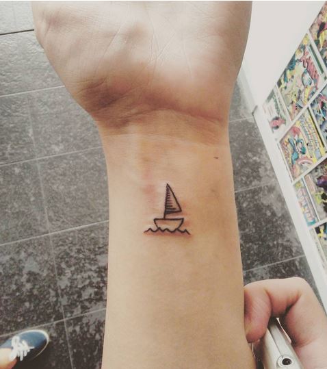 cartoon sailboat tattoo