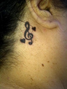 Treble Clef Tattoo Behind Ear