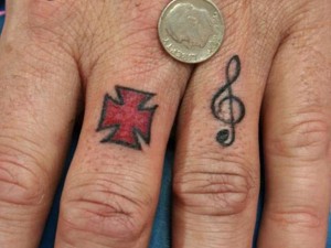 Treble Clef Tattoo Finger