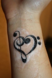 Treble Clef Tattoo Hand