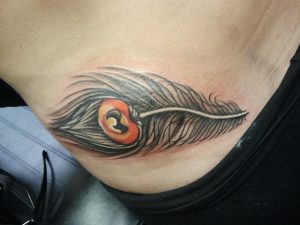 Black Peacock Feather Tattoo