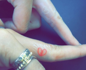 Broken Heart Tattoo on Ring Finger