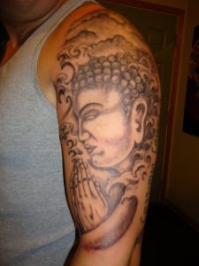 Buddha Arm Tattoo