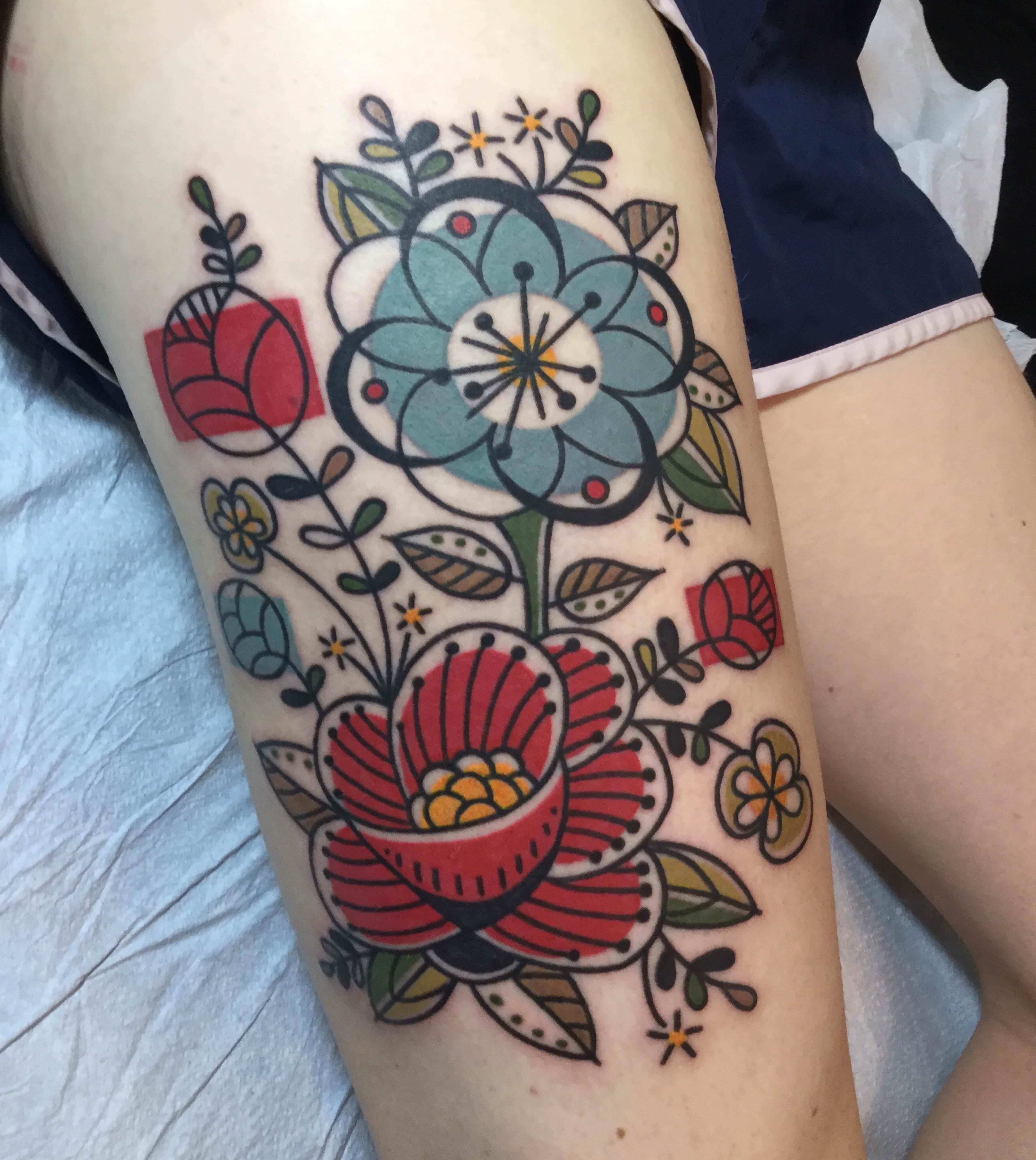 List 98+ Pictures Pictures Of Flower Tattoos Latest