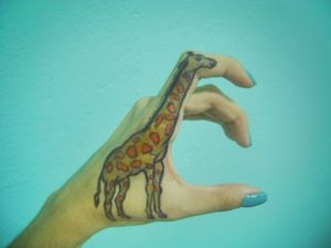 Giraffe Hand Tattoo