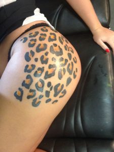 Leopard Print Tattoo on Thigh