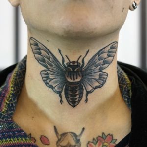 Moth Tattoo on Neck