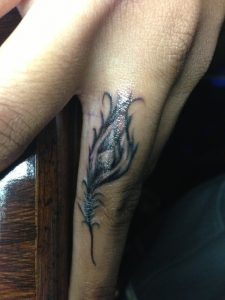 Peacock Feather Tattoo on Finger