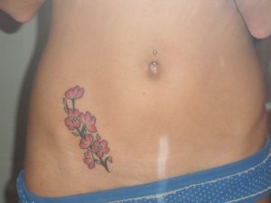 Small Flower Tattoos on Hip