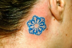Snowflake Tattoo Behind Ear